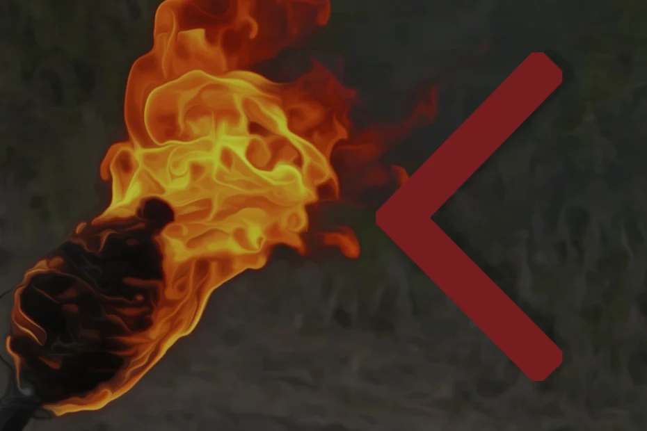 Photo shows a burning torch on the left hand side and the Kenaz rune in red on the right.